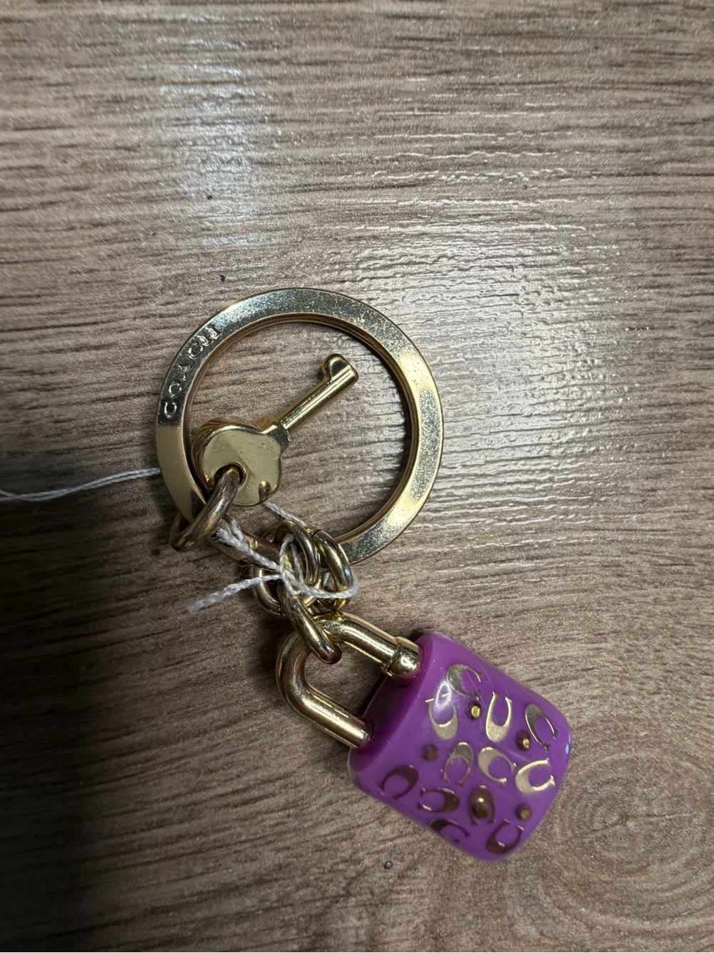 Coach Gold-Tone Keyring with Purple Enamel Padlock Charm and Mini Key - Picture 5 of 5